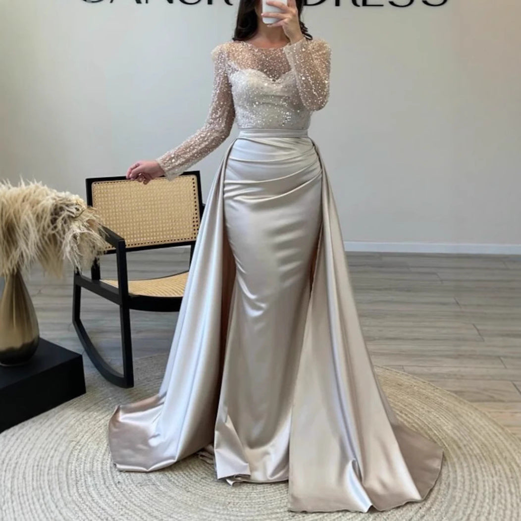 Dazzling Queen Sequin Evening Gowns featuring a long-sleeve beaded design and elegant flared hem.